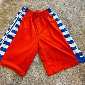Nike Elite Basketball Shorts. Orange and Striped Blue.